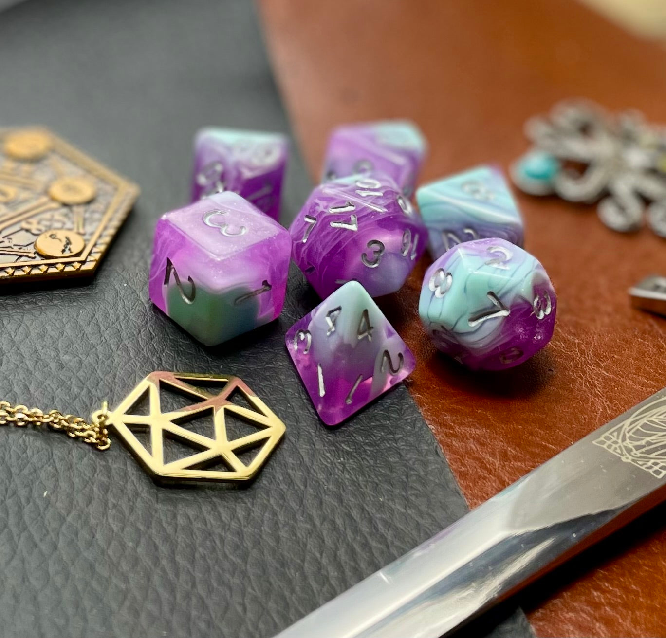 Blueberry Smoothie Polyhedral Dice Set  Almost good enough to eat!  These baby blue and purple swirl resin polyhedral dice sets are a perfect addition to any dice collection.  They are standard 16mm polyhedral dice sets perfect for Tabletop games and RPG's such as pathfinder or dungeons and dragons.  This set includes one of each D20, D12, D10, D%, D8, D6, D4.