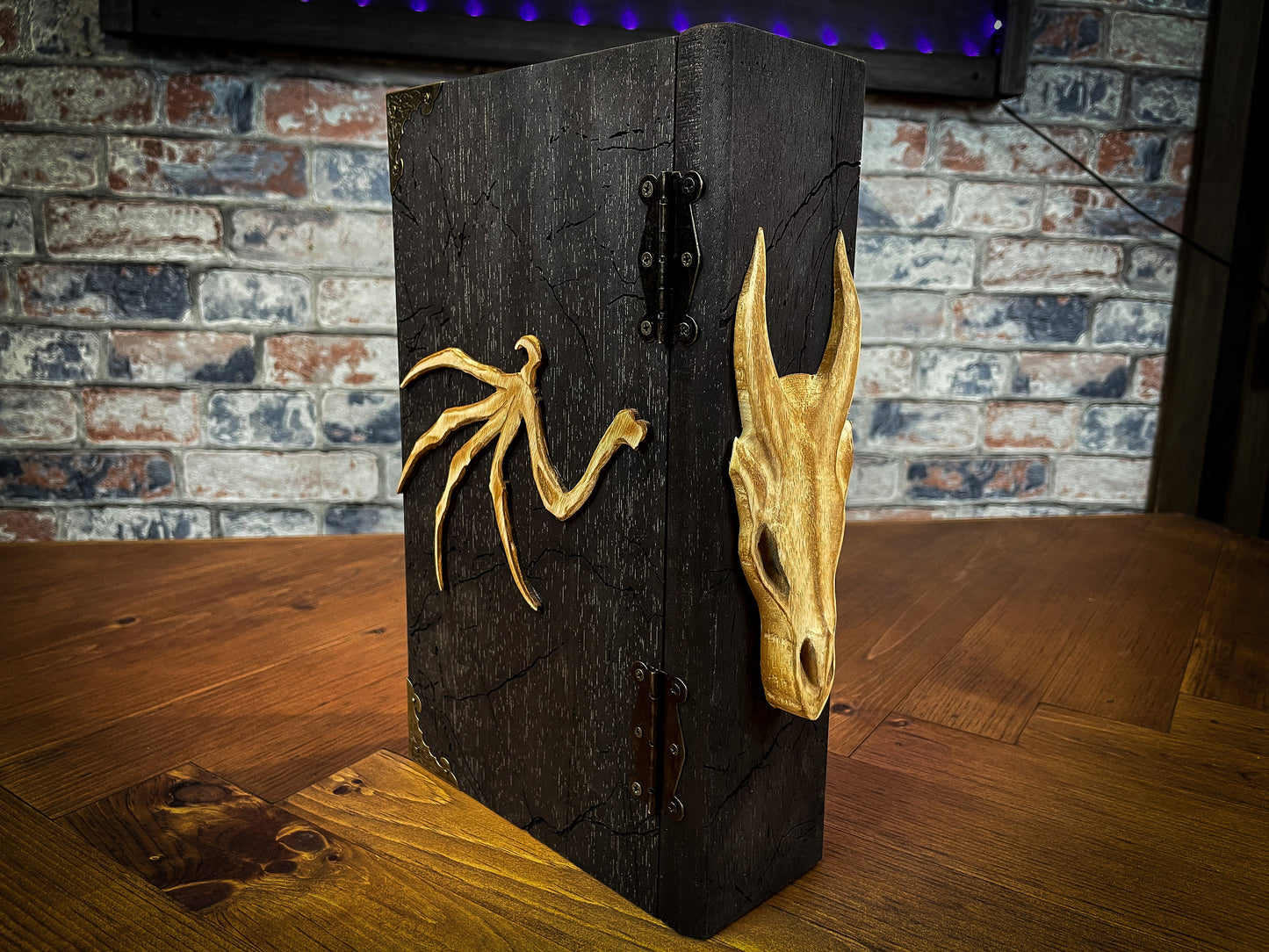 Dragon's Wrath Dungeon Master Screen. Made from solid wood and made to fold to resemble a book when not in use, this screen is stylish, fun and adds atmosphere to any game. Comprising 4 solid wood panels connected using antiqued metal hinges; they fold together to resemble a book when closed. Free UK delivery from Fandomonium