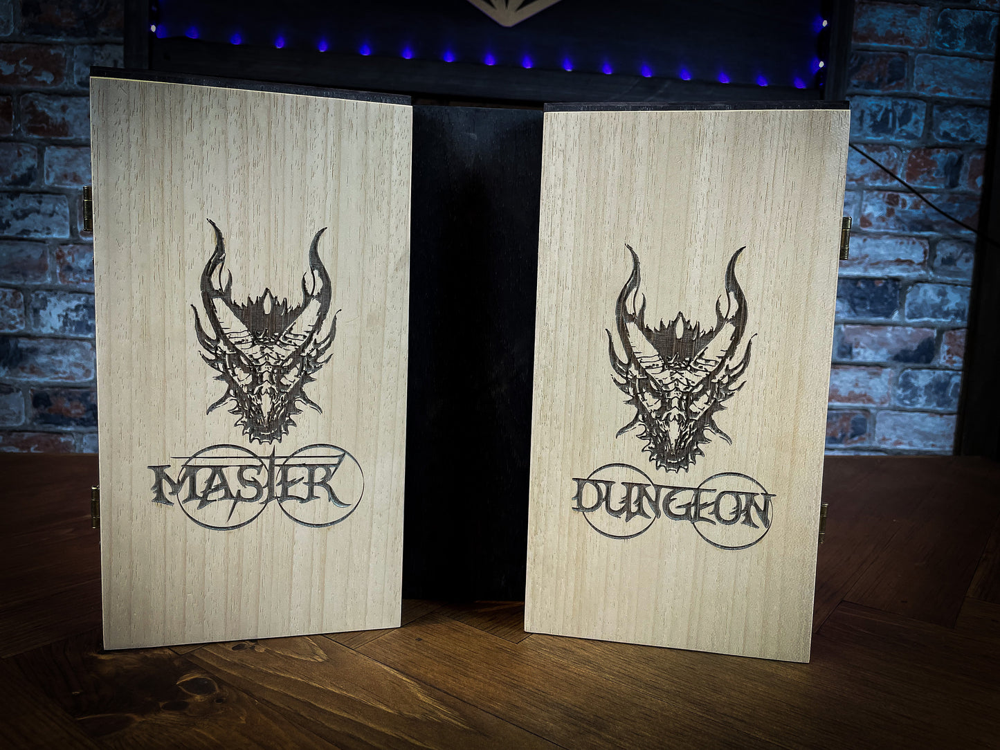 Dragon's Wrath Dungeon Master Screen. Made from solid wood and made to fold to resemble a book when not in use, this screen is stylish, fun and adds atmosphere to any game. Comprising 4 solid wood panels connected using antiqued metal hinges; they fold together to resemble a book when closed. Free UK delivery from Fandomonium