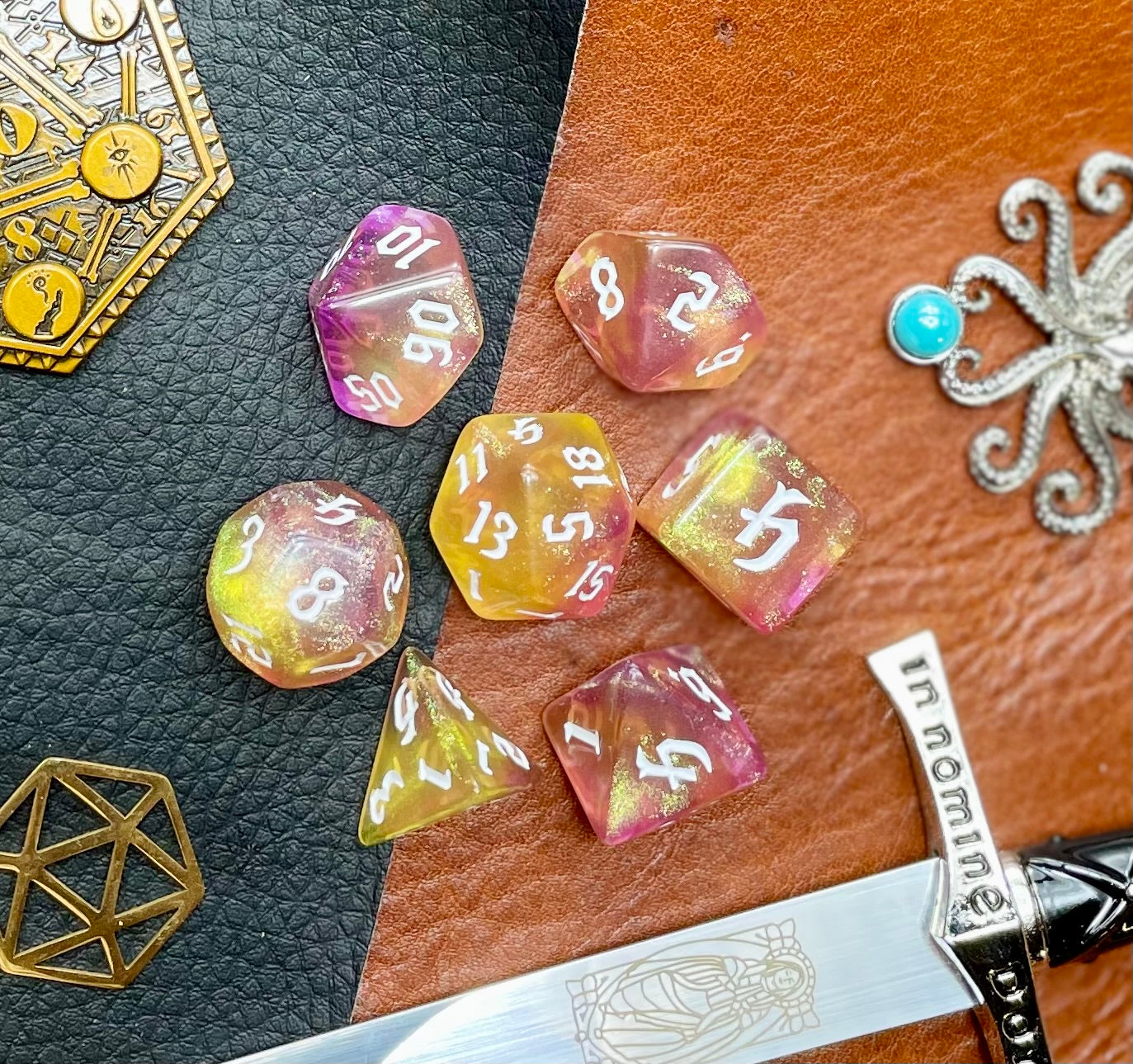 Chaos Fairy Polyhedral Dice Set Roll to the gods with these pink and gold shimmer resin polyhedral dice set. They are standard 16mm polyhedral dice sets perfect for Tabletop games and RPG's such as pathfinder or dungeons and dragons. This set includes one of each D20, D12, D10, D%, D8, D6, D4.