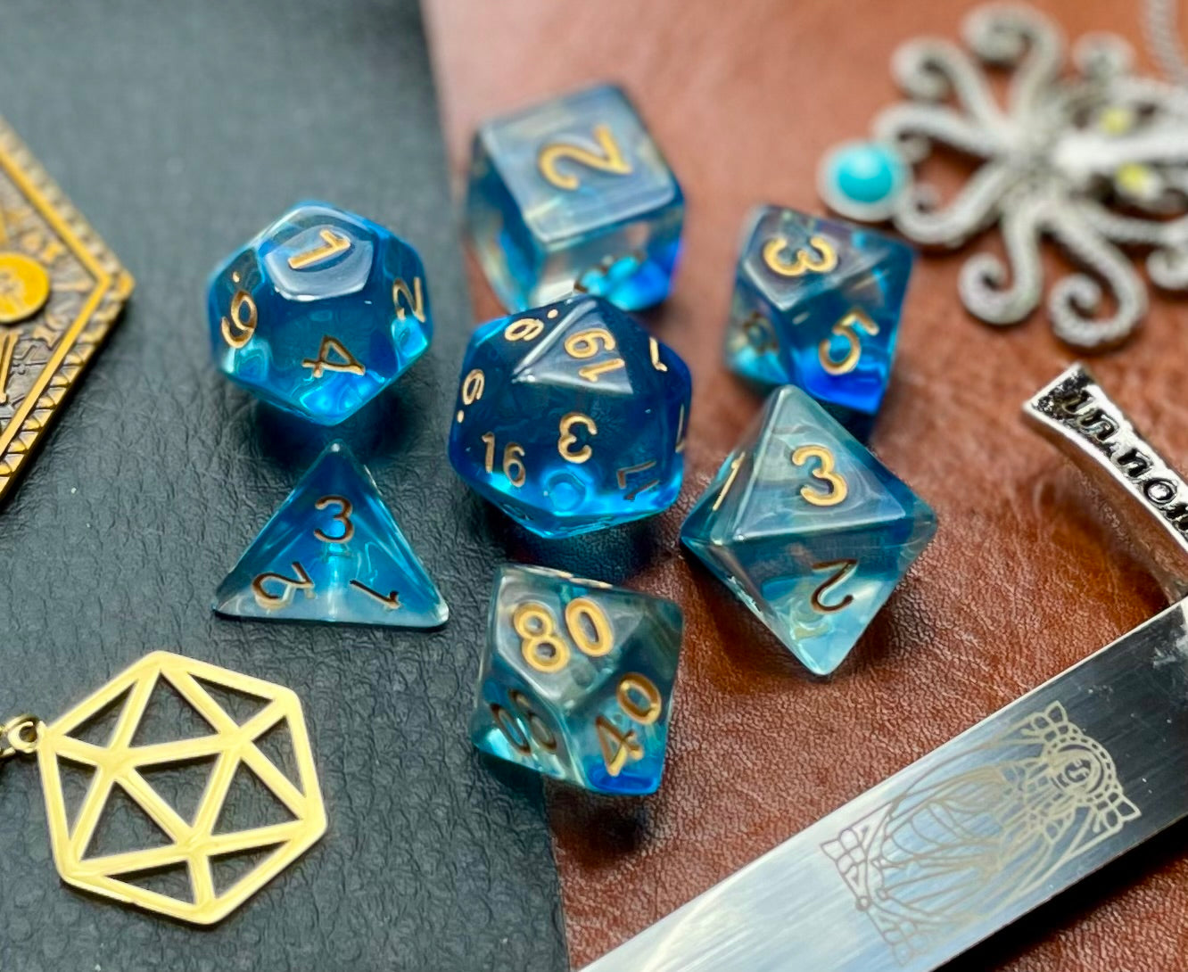 Under The Sea Polyhedral Dice Set Dive the oceans with these translucent blue and clear swirl resin polyhedral dice sets are a perfect addition to any dice collection. They are standard 16mm polyhedral dice sets perfect for Tabletop games and RPG's such as pathfinder or dungeons and dragons. This set includes one of each D20, D12, D10, D%, D8, D6, D4.