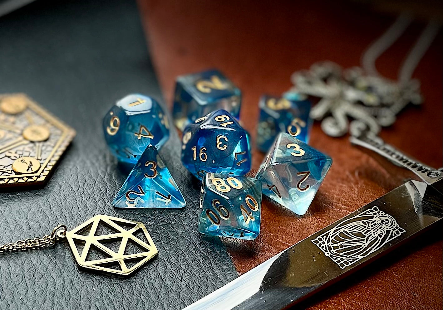 Under The Sea Polyhedral Dice Set Dive the oceans with these translucent blue and clear swirl resin polyhedral dice sets are a perfect addition to any dice collection. They are standard 16mm polyhedral dice sets perfect for Tabletop games and RPG's such as pathfinder or dungeons and dragons. This set includes one of each D20, D12, D10, D%, D8, D6, D4.
