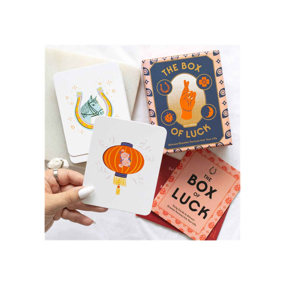 The Box of Luck Tarot Cards Worried about an interview? Want to ace a presentation? Or perhaps you've got the jitters about a first date? Let The Box of Luck help you attract greater fortune and positive energy into your life with 60 good luck symbols from all around the world. Invite more luck into your life or gift good fortune to a friend with this beautifully packaged boxed set of cards, complete with booklet and lucky fortunes. Free UK delivery from Fandomonium