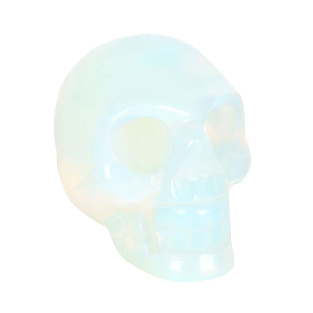 Opalite Crystal Skull This crystal skull is made from opalite which is a stone renowned for its ability to evoke feelings of love, hope, and generosity. The skull is the perfect size for holding in the palm of your hand then you need a little support or reassurance. Free UK delivery by Fandomonium