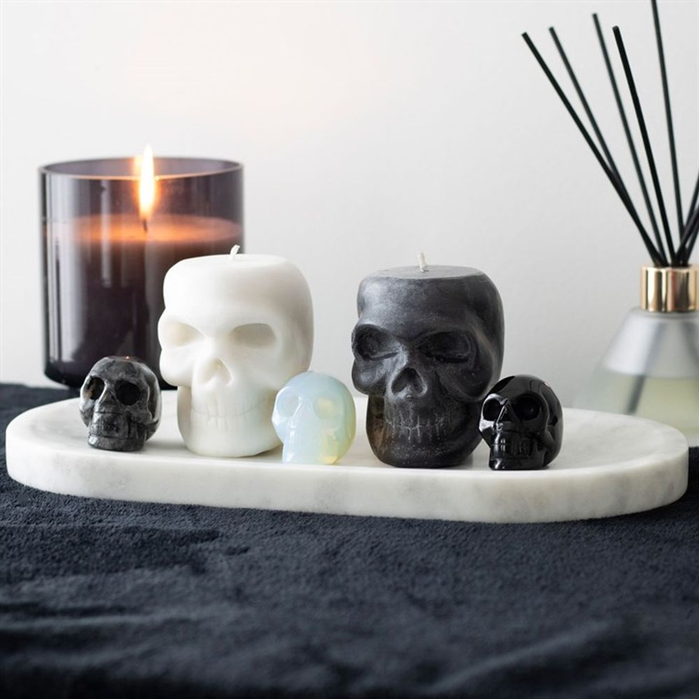 Opalite Crystal Skull This crystal skull is made from opalite which is a stone renowned for its ability to evoke feelings of love, hope, and generosity. The skull is the perfect size for holding in the palm of your hand then you need a little support or reassurance. Free UK delivery by Fandomonium