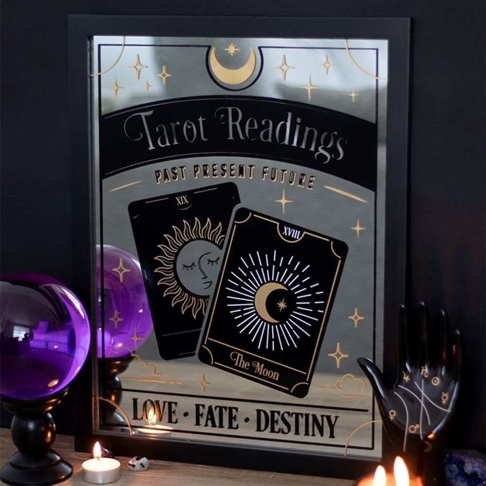 Tarot Readings Mirrored Wall Hanging This mirrored wall hanging is sure to add mystery and whimsy to any trendy home. A mystical tarot card design is accented by gold foil, celestial details and tarot reading text. A truly magical piece to hang on a gallery wall. Free UK delivery by Fandomonium