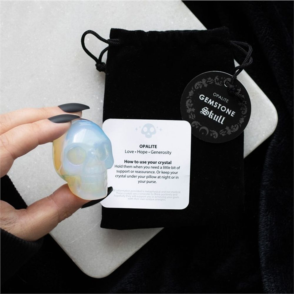 Opalite Crystal Skull This crystal skull is made from opalite which is a stone renowned for its ability to evoke feelings of love, hope, and generosity. The skull is the perfect size for holding in the palm of your hand then you need a little support or reassurance. Free UK delivery by Fandomonium