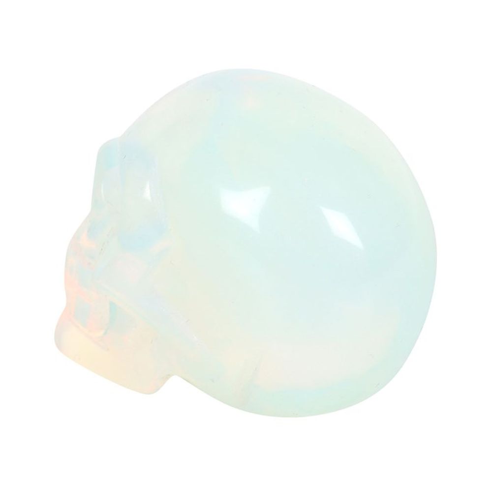 Opalite Crystal Skull This crystal skull is made from opalite which is a stone renowned for its ability to evoke feelings of love, hope, and generosity. The skull is the perfect size for holding in the palm of your hand then you need a little support or reassurance. Free UK delivery by Fandomonium