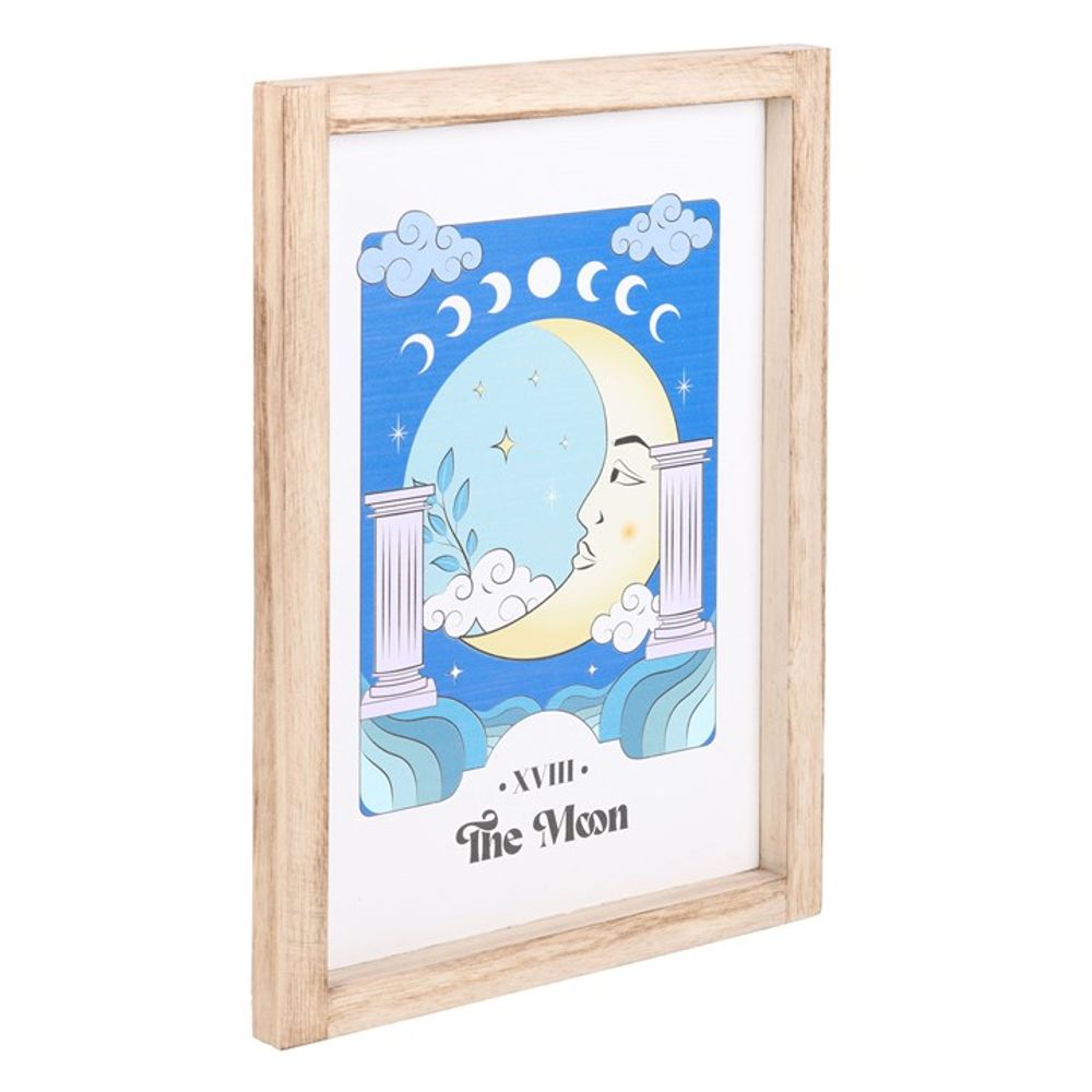 The Moon Celestial Framed Wall Print This framed art print showcasing 'The Moon' brings a touch of celestial magic to any trendsetter's space, blending mystical vibes with a calming color palette. The serene illustration invites calm, ideal for creating a tranquil corner in the home a bustling young adult's life. Free delivery with Fandomonium