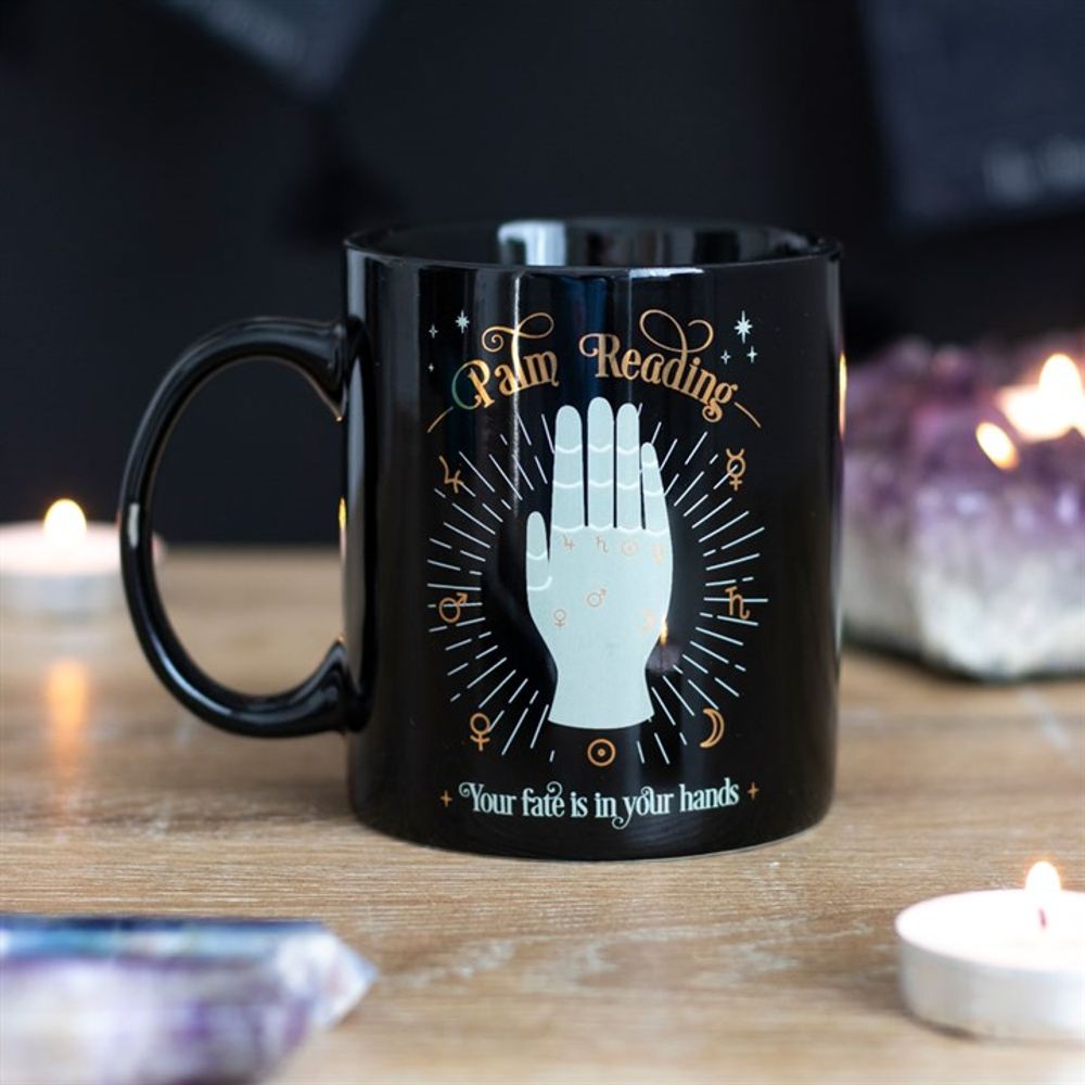 Palm Reading Mug Stylish black mug with a stunning mystical fortune telling design, metallic gold details and the words 'Your fate is in your hands'. Free UK delivery by Fandomonium