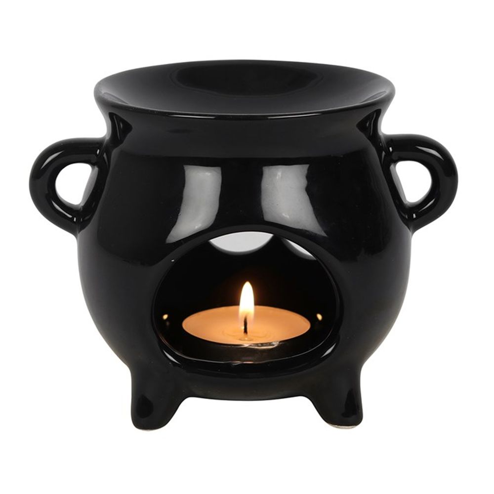 Triple Moon Cauldron Oil Burner Glossy black cauldron-shaped ceramic oil burner with a triple moon cut-out design. A fantastic gift for any of your coven. Free UK delivery by Fandomonium