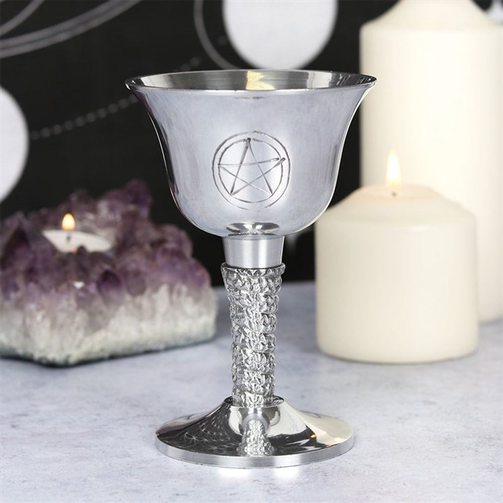 Silver Metal Pentagram Chalice This silver metal chalice features a hand carved pentagram design and twisted vine accent along the stem. Symbolic of the goddess' womb, this shining goblet is perfect for holding wine during sacred rituals....or on Thursdays... Free UK delivery by Fandomonium