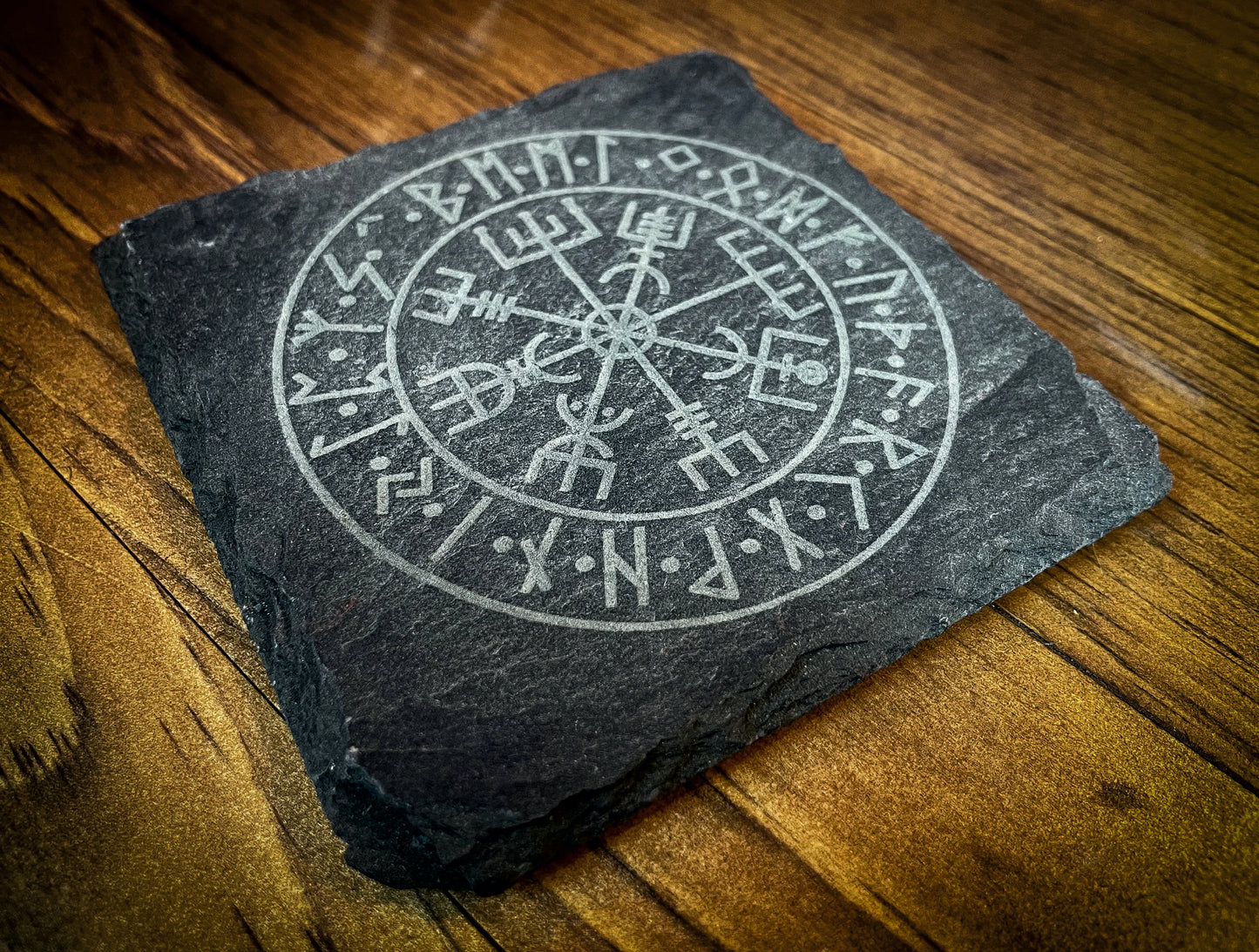 Solid slate engraved coaster. Engraved with the vegvisir; the Viking compass. This coaster is perfect for fans of Norse Mythology and Viking culture.