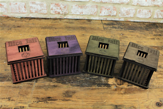 Handmade wooden dice jail in a variety of colours. Perfect for dungeons and dragons, tabletop gaming, rpg's and dice games. Free Delivery by Fandomonium
