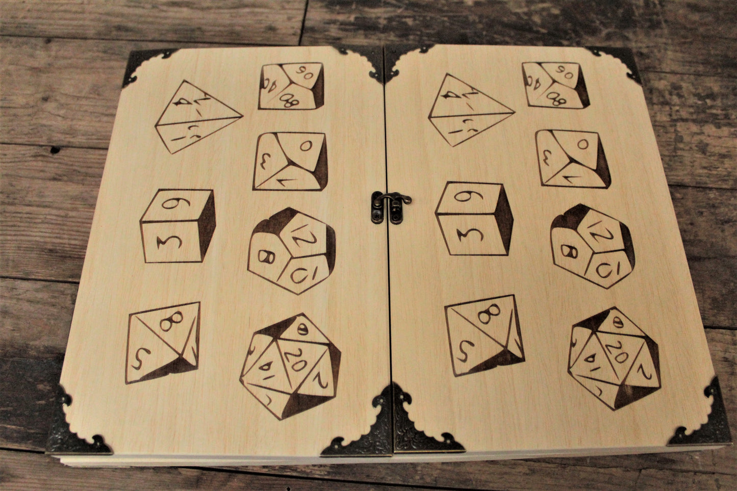 Wooden Dice Design Dungeon Master Screen - Handmade By FandomoniumAn impressive, budget friendly addition to your RPG setup. Featuring Fandomonium's Dice design, the screen's 3 sections fold on hinges and has an antique effect catch for easy storage. The finish is aged and antiqued by hand to give you that rustic, tavern feel. Hand made by Fandomonium