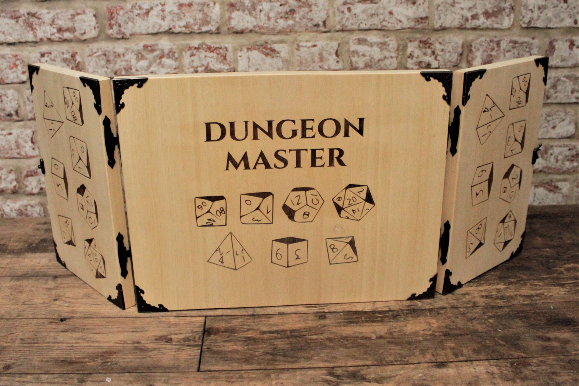 Wooden Dice Design Dungeon Master Screen -  Handmade By FandomoniumAn impressive, budget friendly addition to your RPG setup. Featuring Fandomonium's Dice design, the screen's 3 sections fold on hinges and has an antique effect catch for easy storage. The finish is aged and antiqued by hand to give you that rustic, tavern feel. Hand made by Fandomonium