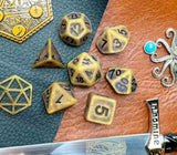 Ancient gold effect resin polyhedral dice set.  Yet another reason to add to your growing dice collection with these fantastic resin dice.  They are standard 16mm polyhedral dice sets perfect for Tabletop games and RPG's such as pathfinder or dungeons and dragons.  This set includes one of each D20, D12, D10, D%, D8, D6, D4.