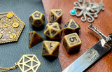 Ancient gold effect resin polyhedral dice set.  Yet another reason to add to your growing dice collection with these fantastic resin dice.  They are standard 16mm polyhedral dice sets perfect for Tabletop games and RPG's such as pathfinder or dungeons and dragons.  This set includes one of each D20, D12, D10, D%, D8, D6, D4.