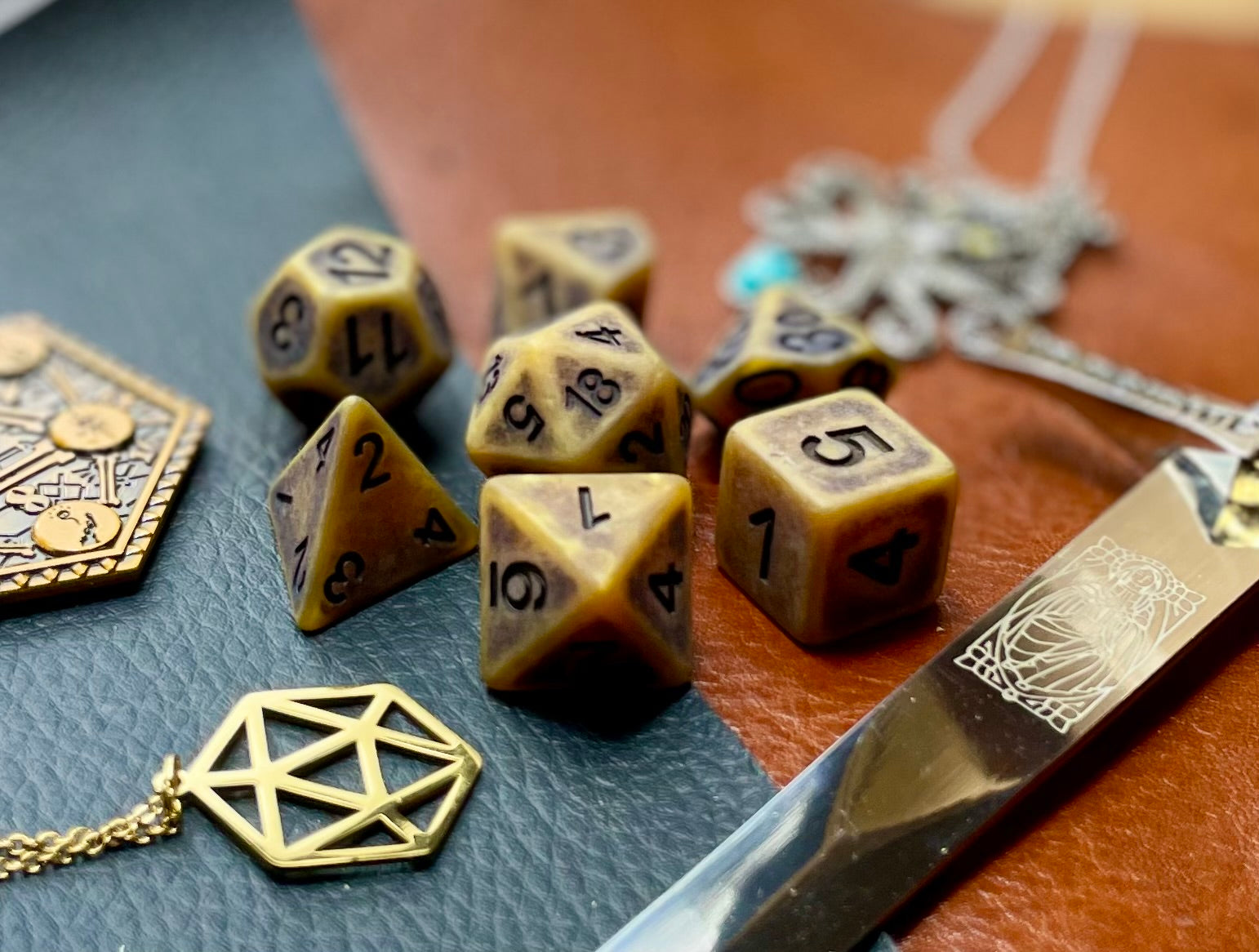 Ancient gold effect resin polyhedral dice set.  Yet another reason to add to your growing dice collection with these fantastic resin dice.  They are standard 16mm polyhedral dice sets perfect for Tabletop games and RPG's such as pathfinder or dungeons and dragons.  This set includes one of each D20, D12, D10, D%, D8, D6, D4.