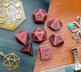 Ancient red stone effect resin polyhedral dice set.  Yet another reason to add to your growing dice collection with these fantastic resin dice.  They are standard 16mm polyhedral dice sets perfect for Tabletop games and RPG's such as pathfinder or dungeons and dragons.  This set includes one of each D20, D12, D10, D%, D8, D6, D4.