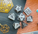 Ancient silver effect resin polyhedral dice set.  Yet another reason to add to your growing dice collection with these fantastic resin dice.  They are standard 16mm polyhedral dice sets perfect for Tabletop games and RPG's such as pathfinder or dungeons and dragons.  This set includes one of each D20, D12, D10, D%, D8, D6, D4.
