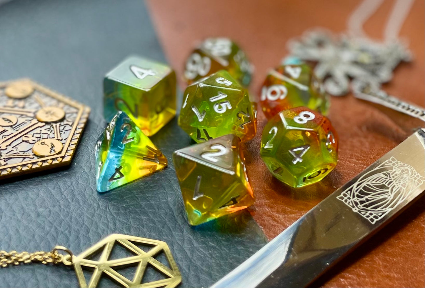 Aurora Autumn resin polyhedral dice set.  Yet another reason to add to your growing dice collection with these fantastic resin dice. These are beautiful translucent dice featuring a full range of autumnal yellows, golds and oranges.   They are standard 16mm polyhedral dice sets perfect for Tabletop games and RPG's such as pathfinder or dungeons and dragons.  This set includes one of each D20, D12, D10, D%, D8, D6, D4.