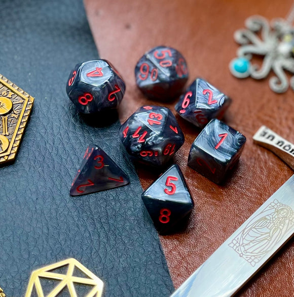 Black Velvet Chessex Dice Set  These genuine Chessex polyhedral dice sets are a perfect addition to any dice collection.  They are standard 16mm polyhedral dice sets perfect for Tabletop games and RPG's such as pathfinder or dungeons and dragons.  This set includes one of each D20, D12, D10, D%, D8, D6, D4.  Why Choose Chessex?  Chessex are the market leaders in quality of dice and consistency of roll and have been creating dice for over 30 years