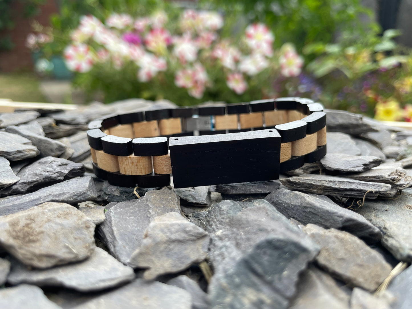 Black Walnut & Zebrano Bracelet

Made from solid walnut and "Zebra Wood" Zebrano; these bracelets are both comfortable to wear and a unique piece of jewellery.