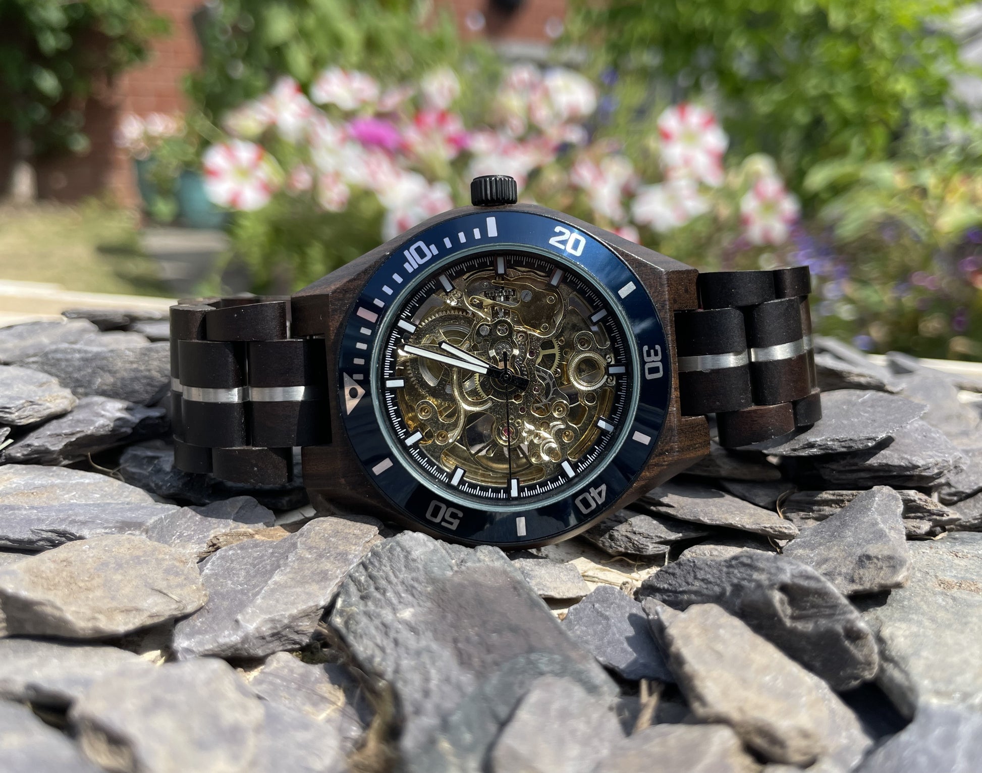 Black Wood & Blue Cog Style Interlocking Strap Self Winding Wooden Eco Watch

Made from solid wood with silver and blue anodised stainless steel; these watches are both comfortable to wear and a unique timepiece.