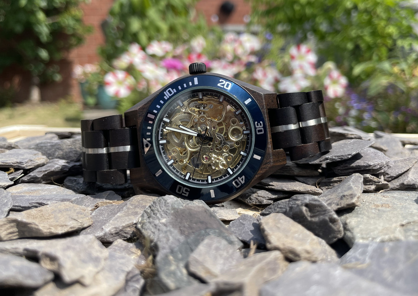 Black Wood & Blue Cog Style Interlocking Strap Self Winding Wooden Eco Watch

Made from solid wood with silver and blue anodised stainless steel; these watches are both comfortable to wear and a unique timepiece.