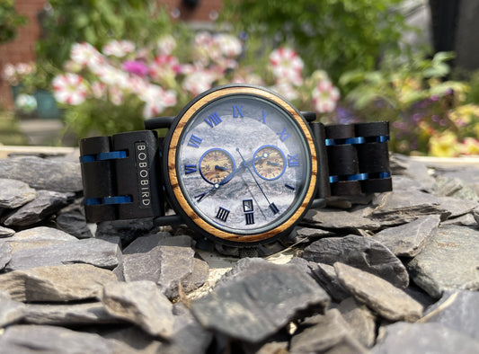 Black Wood & Blue Metal Interlocking Strap Self Winding Wooden Eco Watch

Made from solid wood and blue anodised stainless steel; these watches are both comfortable to wear and a unique timepiece. Free UK delivery by Fandomonium
