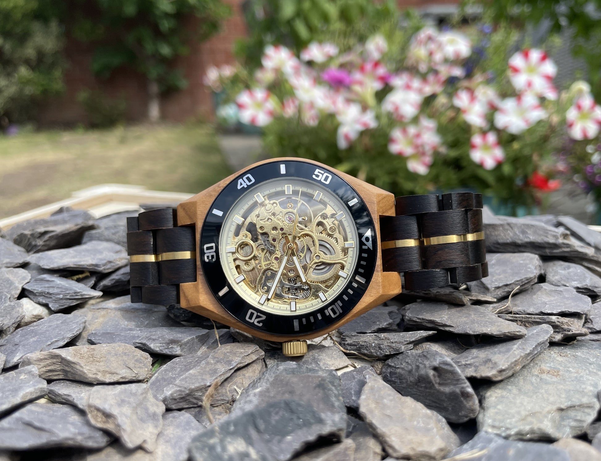 Black Wood & Gold Cog Style Interlocking Strap Self Winding Wooden Eco Watch

Made from solid wood and gold anodised stainless steel; these watches are both comfortable to wear and a unique timepiece.