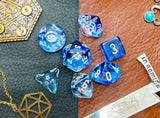 Dark Blue Nebula Chessex Dice Set  These genuine Chessex polyhedral dice sets are a perfect addition to any dice collection.  They are standard 16mm polyhedral dice sets perfect for Tabletop games and RPG's such as pathfinder or dungeons and dragons.  This set includes one of each D20, D12, D10, D%, D8, D6, D4.  Why Choose Chessex?  Chessex are the market leaders in quality of dice and consistency of roll and have been creating dice for over 30 years