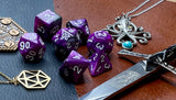 Elemental Steel and Purple resin polyhedral dice set.  Awaken the elements with these fantastic resin dice. Combining vibrant purple and steel swirls; each dice has its own unique pattern.  They are standard 16mm polyhedral dice sets perfect for Tabletop games and RPG's such as pathfinder or dungeons and dragons.  This set includes one of each D20, D12, D10, D%, D8, D6, D4.