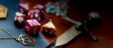 Elemental Yellow and Pink resin polyhedral dice set.  Awaken the elements with these fantastic resin dice. Combining vibrant yellow and pink swirls; each dice has its own unique pattern.  They are standard 16mm polyhedral dice sets perfect for Tabletop games and RPG's such as pathfinder or dungeons and dragons.  This set includes one of each D20, D12, D10, D%, D8, D6, D4.