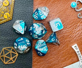 Gemini Steel Teal Chessex Dice Set These genuine Chessex polyhedral dice sets are a perfect addition to any dice collection. They are standard 16mm polyhedral dice sets perfect for Tabletop games and RPG's such as pathfinder or dungeons and dragons. Free UK Delivery by Fandomonium