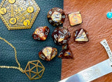 Gold Lustrous Chessex Dice Set  These genuine Chessex polyhedral dice sets are a perfect addition to any dice collection.  They are standard 16mm polyhedral dice sets perfect for Tabletop games and RPG's such as pathfinder or dungeons and dragons.  This set includes one of each D20, D12, D10, D%, D8, D6, D4.  Why Choose Chessex?  Chessex are the market leaders in quality of dice and consistency of roll and have been creating dice for over 30 years