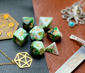 Green and White Marble Polyhedral Dice Set  Roll with style with these green and white marbled resin polyhedral dice set.  They are standard 16mm polyhedral dice sets perfect for Tabletop games and RPG's such as pathfinder or dungeons and dragons.  This set includes one of each D20, D12, D10, D%, D8, D6, D4.