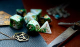 Green and White Marble Polyhedral Dice Set  Roll with style with these green and white marbled resin polyhedral dice set.  They are standard 16mm polyhedral dice sets perfect for Tabletop games and RPG's such as pathfinder or dungeons and dragons.  This set includes one of each D20, D12, D10, D%, D8, D6, D4.