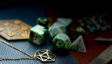 Green and White Marble Polyhedral Dice Set  Roll with style with these green and white marbled resin polyhedral dice set.  They are standard 16mm polyhedral dice sets perfect for Tabletop games and RPG's such as pathfinder or dungeons and dragons.  This set includes one of each D20, D12, D10, D%, D8, D6, D4.