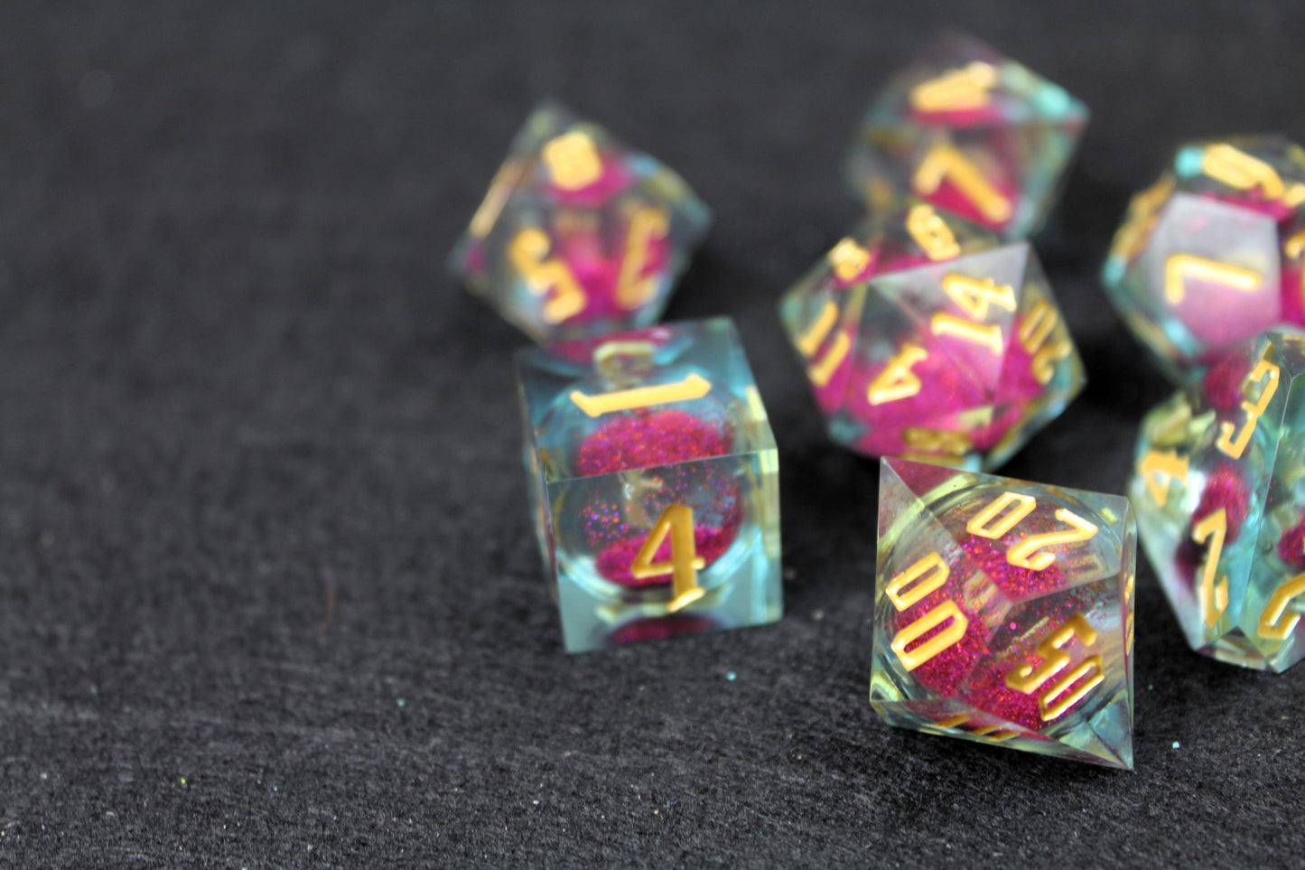 Purple And Clear Liquid Core Sharp Edge Dice Set

Polished luxury sharp edge dice set

Roll in style with these polyhedral dice sets perfect for Tabletop games and RPG's such as pathfinder or dungeons and dragons.

This set includes one of each D20, D12, D10, D%, D8, D6, D4.

Available both with or without a PU leather dice storage box.