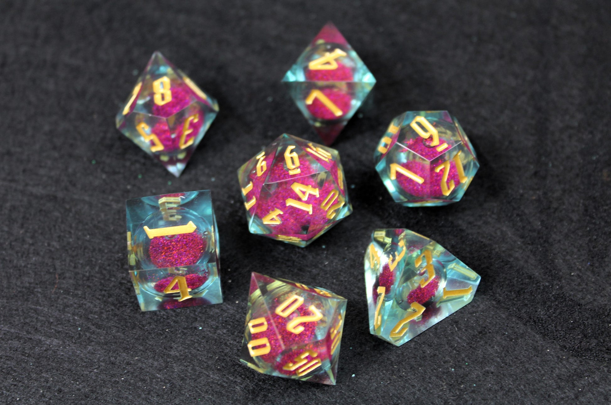 Purple And Clear Liquid Core Sharp Edge Dice Set

Polished luxury sharp edge dice set

Roll in style with these polyhedral dice sets perfect for Tabletop games and RPG's such as pathfinder or dungeons and dragons.

This set includes one of each D20, D12, D10, D%, D8, D6, D4.

Available both with or without a PU leather dice storage box.