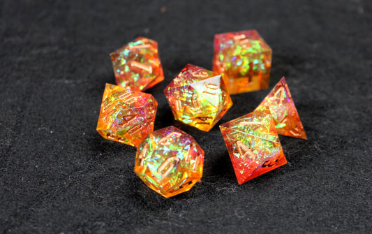 Gold &amp; Orange Glitter Sharp Edge Dice Set

Polished luxury sharp edge dice set

Roll in style with these polyhedral dice sets perfect for Tabletop games and RPG's such as pathfinder or dungeons and dragons.

This set includes one of each D20, D12, D10, D%, D8, D6, D4.

Available both with or without a PU leather dice storage box.