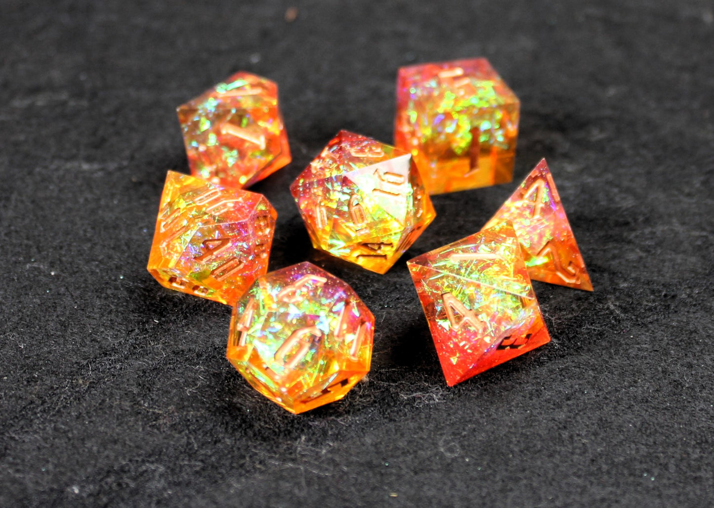 Gold &amp; Orange Glitter Sharp Edge Dice Set

Polished luxury sharp edge dice set

Roll in style with these polyhedral dice sets perfect for Tabletop games and RPG's such as pathfinder or dungeons and dragons.

This set includes one of each D20, D12, D10, D%, D8, D6, D4.

Available both with or without a PU leather dice storage box.