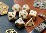 Ivory Marble Chessex Dice Set  These genuine Chessex polyhedral dice sets are a perfect addition to any dice collection.  They are standard 16mm polyhedral dice sets perfect for Tabletop games and RPG's such as pathfinder or dungeons and dragons.  This set includes one of each D20, D12, D10, D%, D8, D6, D4.  Why Choose Chessex?  Chessex are the market leaders in quality of dice and consistency of roll and have been creating dice for over 30 years