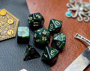 Jade Gold Scarab Chessex Dice Set  These genuine Chessex polyhedral dice sets are a perfect addition to any dice collection.  They are standard 16mm polyhedral dice sets perfect for Tabletop games and RPG's such as pathfinder or dungeons and dragons.  This set includes one of each D20, D12, D10, D%, D8, D6, D4.  Why Choose Chessex?  Chessex are the market leaders in quality of dice and consistency of roll and have been creating dice for over 30 years
