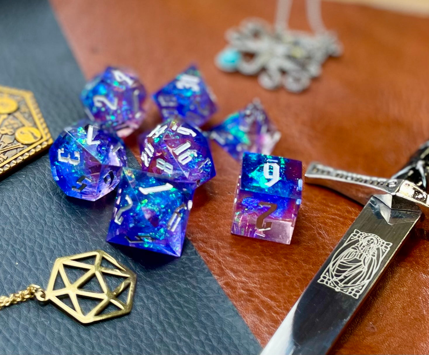 Light Blue and Pink Glitter Sharp Edge Dice Set Polished luxury sharp edge dice set Roll in style with these polyhedral dice sets perfect for Tabletop games and RPG's such as pathfinder or dungeons and dragons. Free UK Delivery by Fandomonium