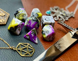 Gates of Oblivion Marble Polyhedral Dice Set  March of the Gates of Oblivion with these white, black, grey, purple and yellow marbled resin polyhedral dice set.  They are standard 16mm polyhedral dice sets perfect for Tabletop games and RPG's such as pathfinder or dungeons and dragons.  This set includes one of each D20, D12, D10, D%, D8, D6, D4.