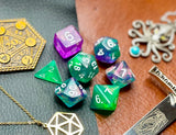 Mythic Potion Polyhedral Dice Set  Watch the ingredients mix with these green and purple swirl resin polyhedral dice set.   They are standard 16mm polyhedral dice sets perfect for Tabletop games and RPG's such as pathfinder or dungeons and dragons.  This set includes one of each D20, D12, D10, D%, D8, D6, D4.