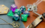 Mythic Potion Polyhedral Dice Set  Watch the ingredients mix with these green and purple swirl resin polyhedral dice set.   They are standard 16mm polyhedral dice sets perfect for Tabletop games and RPG's such as pathfinder or dungeons and dragons.  This set includes one of each D20, D12, D10, D%, D8, D6, D4.